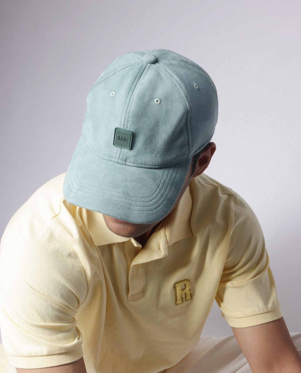 Rare Rabbit Men Armour Teal Suede Monotone Color Silicone Badge Branding Cap