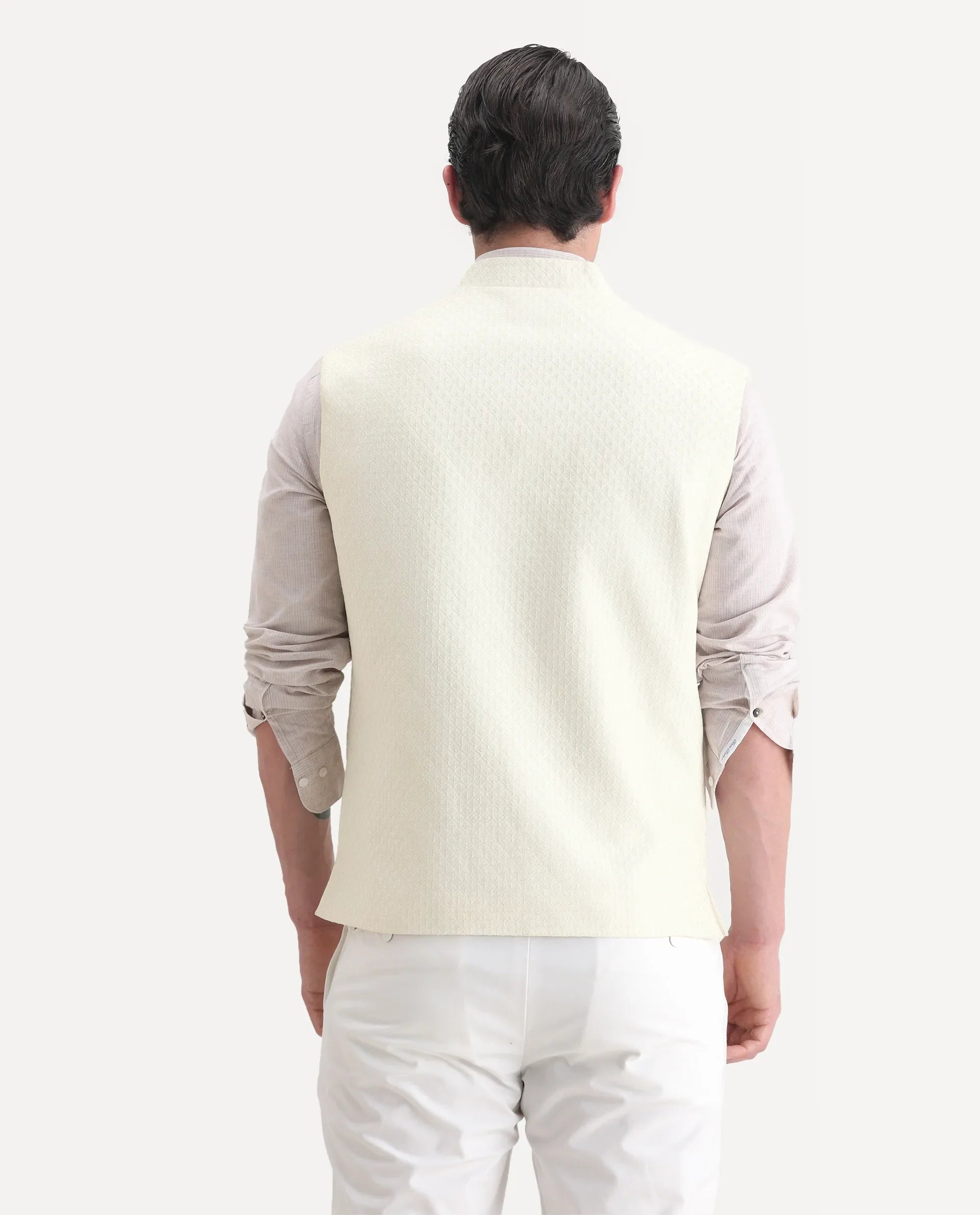 Rare Rabbit Men's Guild Festive Lasmos B1 Off White Polyester Blend Embroidered Regular Fit Sleeveless Mandarin Collar Bandhgala Rare Rabbit Men's Lasmos-B1 Beige Polyester Blend Embroidered Regular Fit Sleeveless Mandarin Collar Bandhgala Nehru Jacket