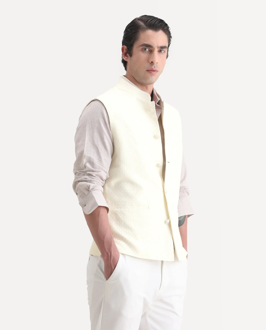 Rare Rabbit Men's Guild Festive Lasmos B1 Off White Polyester Blend Embroidered Regular Fit Sleeveless Mandarin Collar Bandhgala Rare Rabbit Men's Lasmos-B1 Beige Polyester Blend Embroidered Regular Fit Sleeveless Mandarin Collar Bandhgala Nehru Jacket