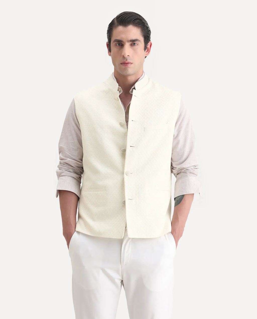 Rare Rabbit Men's Guild Festive Lasmos B1 Off White Polyester Blend Embroidered Regular Fit Sleeveless Mandarin Collar Bandhgala Rare Rabbit Men's Lasmos-B1 Beige Polyester Blend Embroidered Regular Fit Sleeveless Mandarin Collar Bandhgala Nehru Jacket